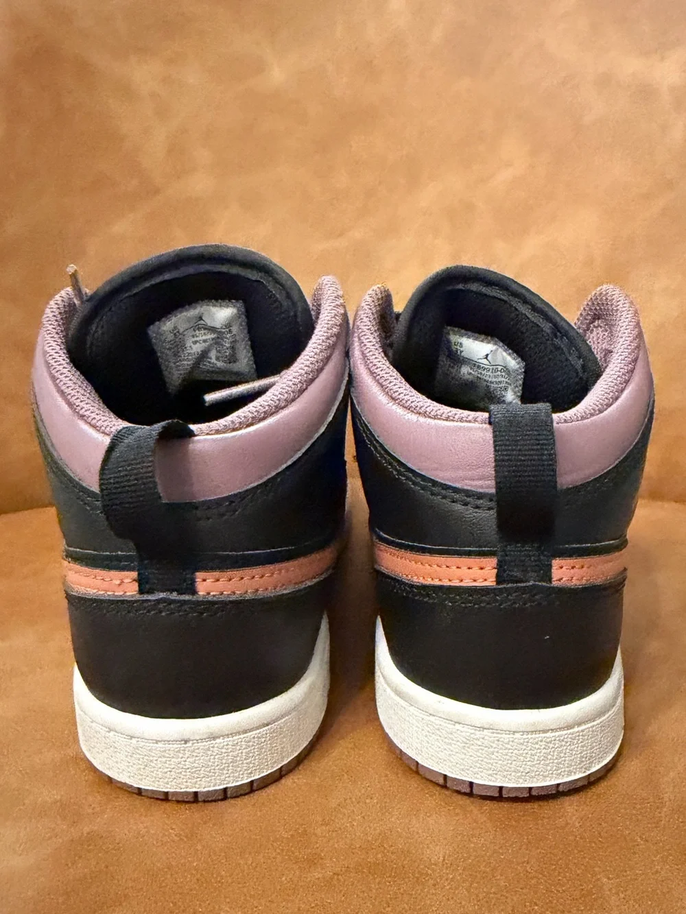 Jordan Nike Kids' Mid-Top Sneakers in Black, Mauve, and Orange. Size 3Y
